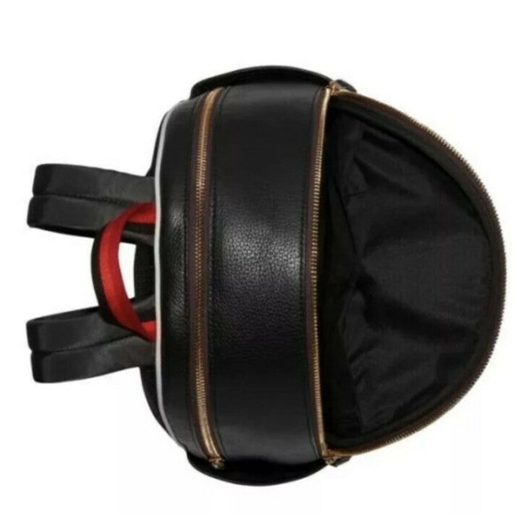 coach court backpack in signature canvas with tiger Signature coated canvas and smooth leather Inside zip cell phone and multifunction pockets Laptop compartment with zip closure Zip closure recycled polyester lining Top handle with 3 drop Outside zip pocket Luggage sleeve Adjustable shoulder straps Fits a 16 laptop 11 3/4 (L) x 16 1/2 (H) x 6 (W) Style No. Coach printed backpack - Gem